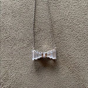 Henri Bendel bow tie pendant on necklace